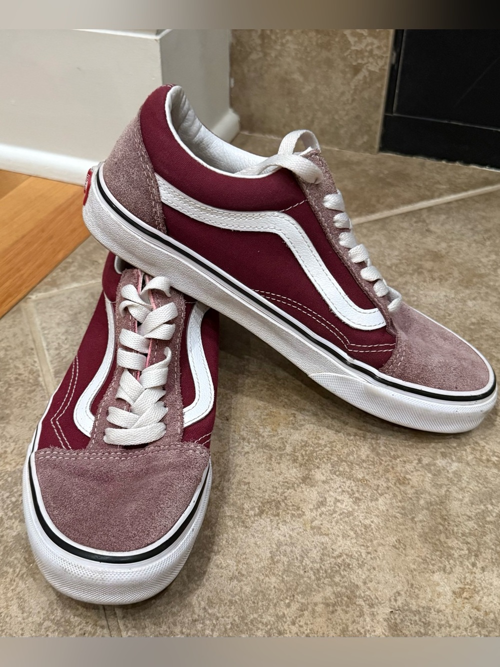 iconic Vans Old Skool Shoes in a burgundy or maroon colorway. $50